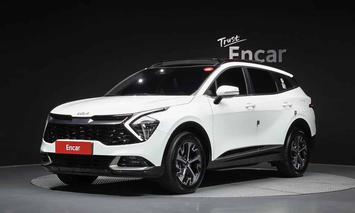 Kia Sportage — фото 1