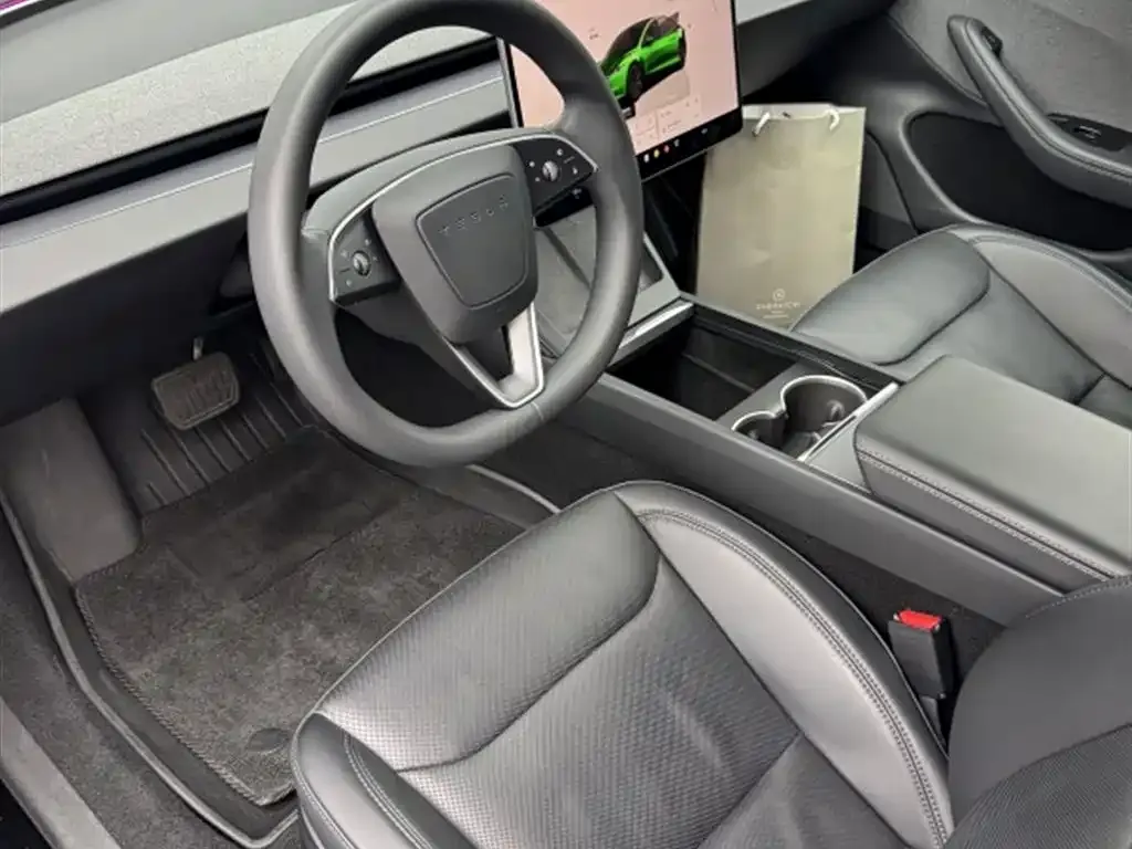 Tesla Model 3 — фото 4