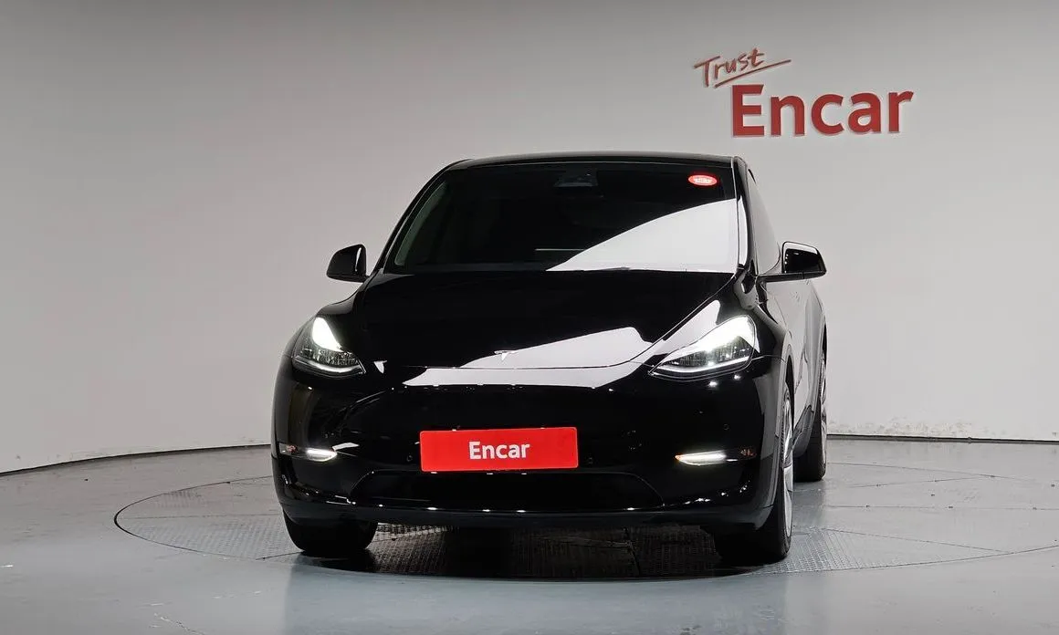 Tesla Model Y — фото 7