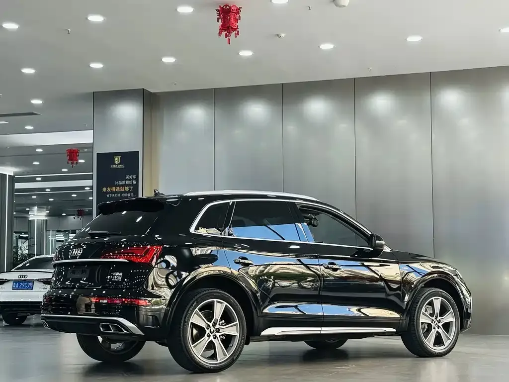 Audi Q5L — фото 7
