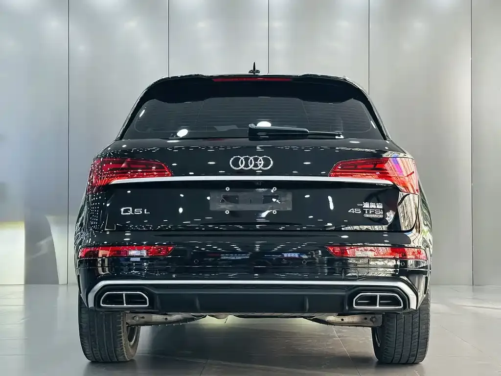 Audi Q5L — фото 10