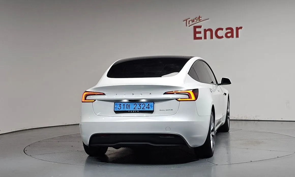 Tesla Model 3 — фото 7