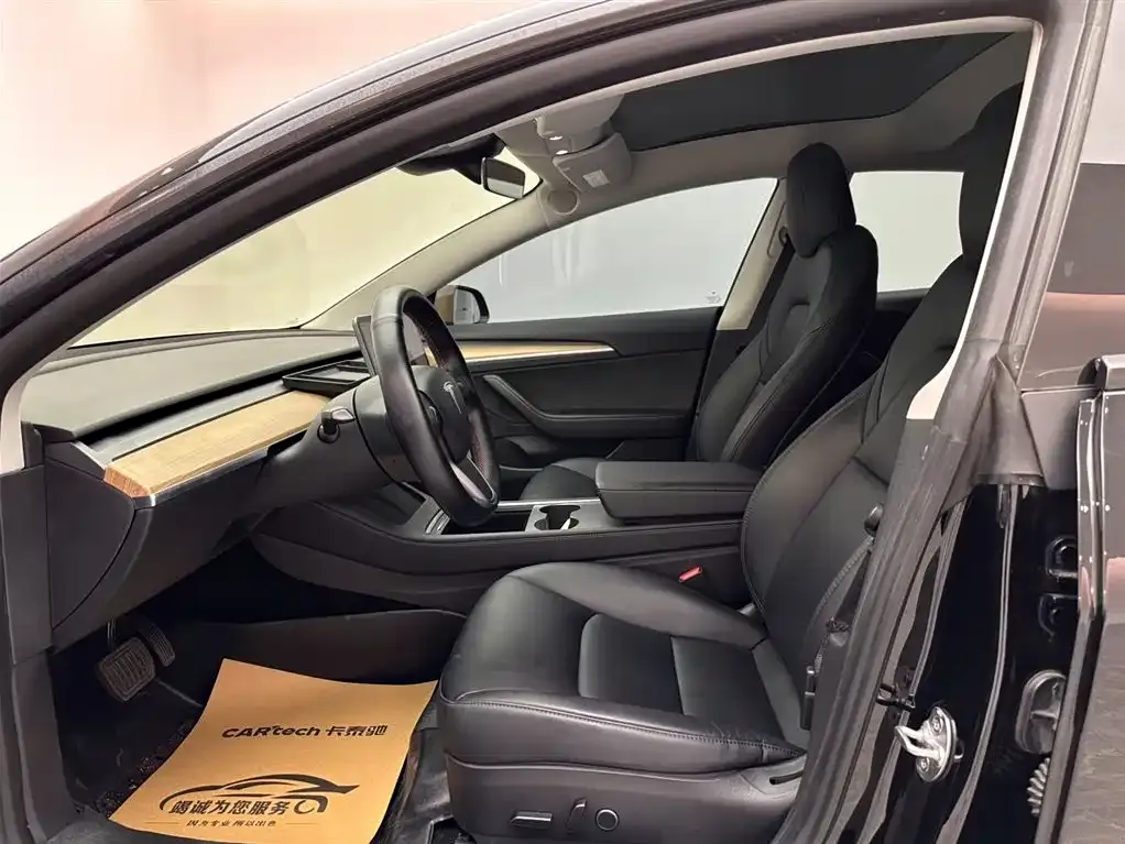 Tesla Model 3 — фото 10