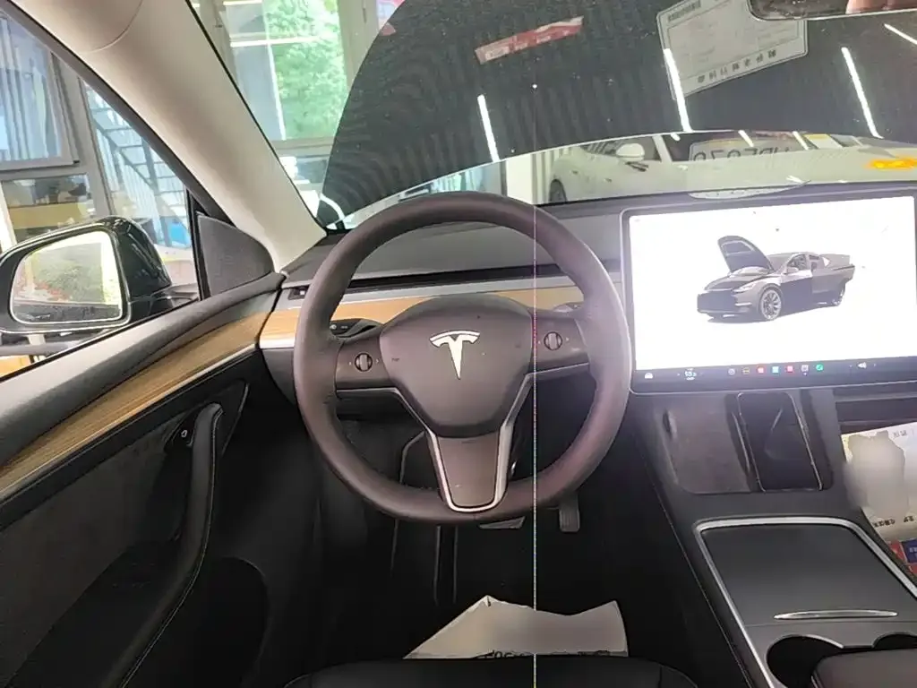 Tesla Model Y — фото 7