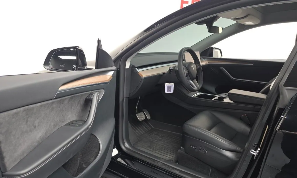 Tesla Model Y — фото 6