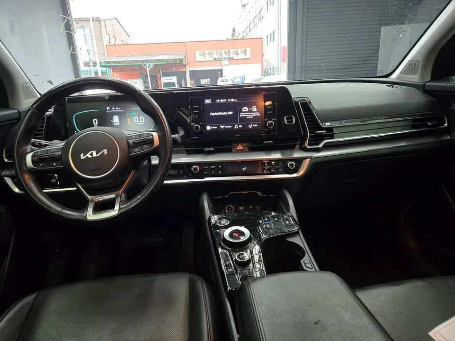 Kia Sportage — фото 8
