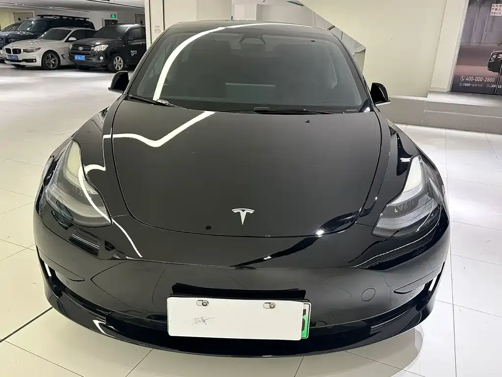 Tesla Model 3 — фото 10