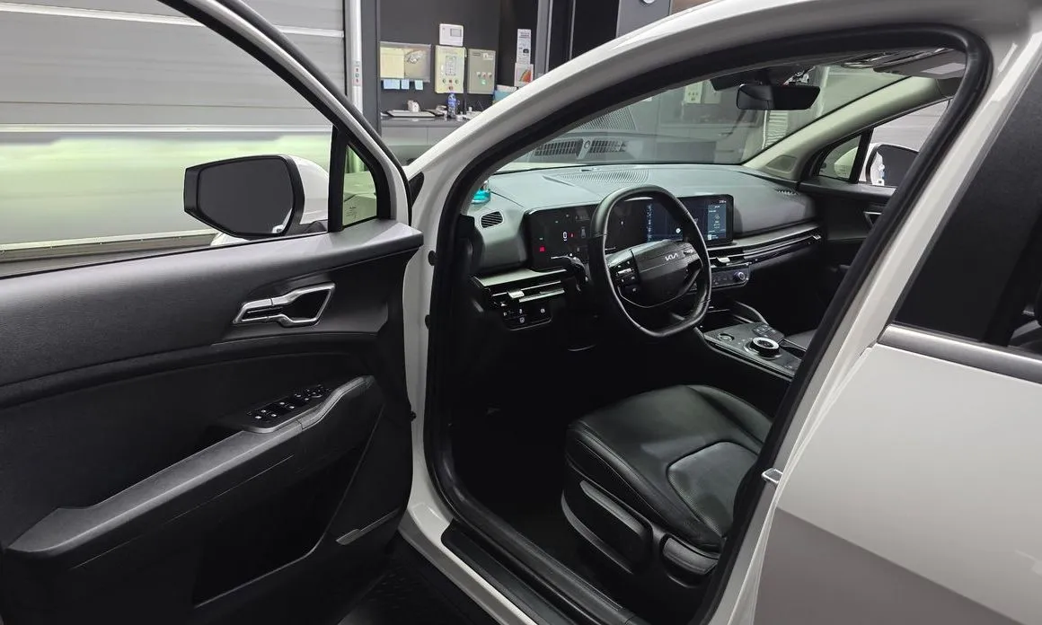 Kia Sportage — фото 10