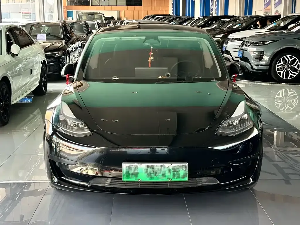 Tesla Model 3 — фото 9