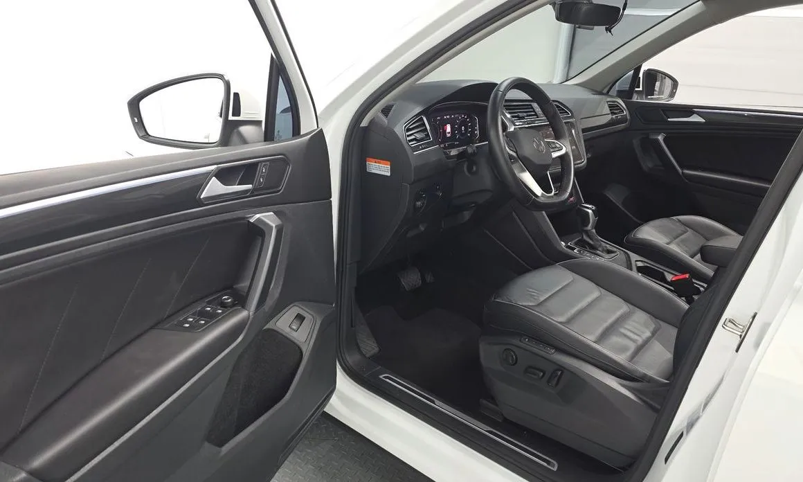 Volkswagen Tiguan — фото 9
