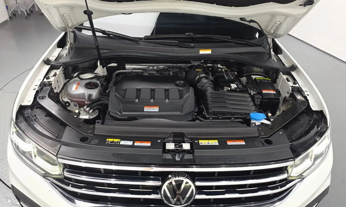 Volkswagen Tiguan — фото 8