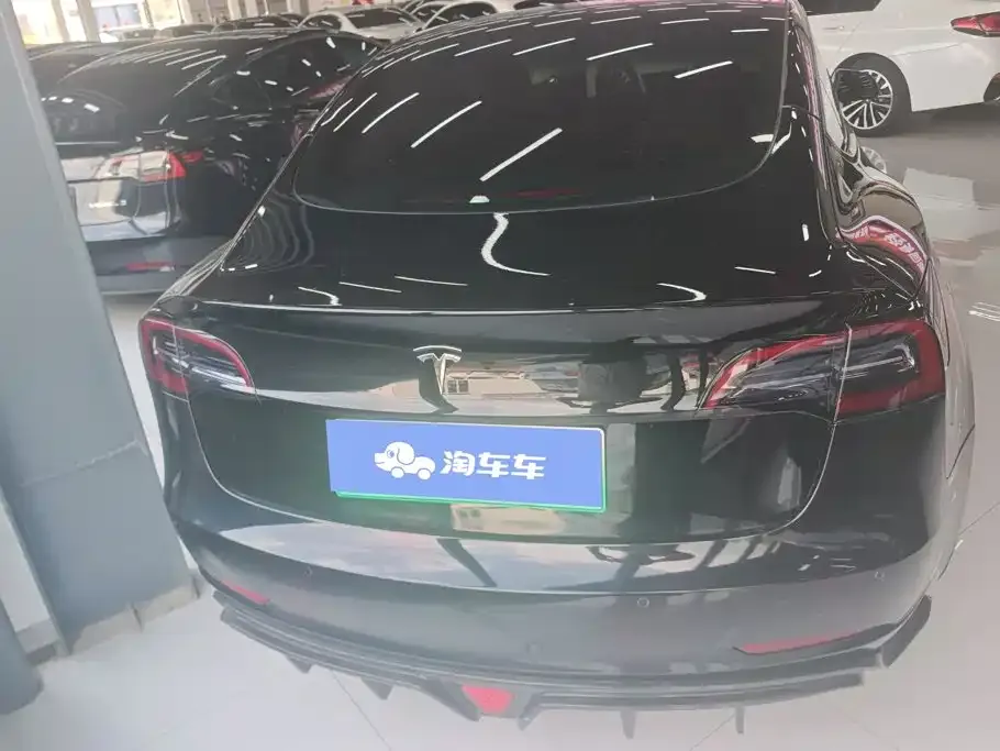 Tesla Model 3 — фото 4