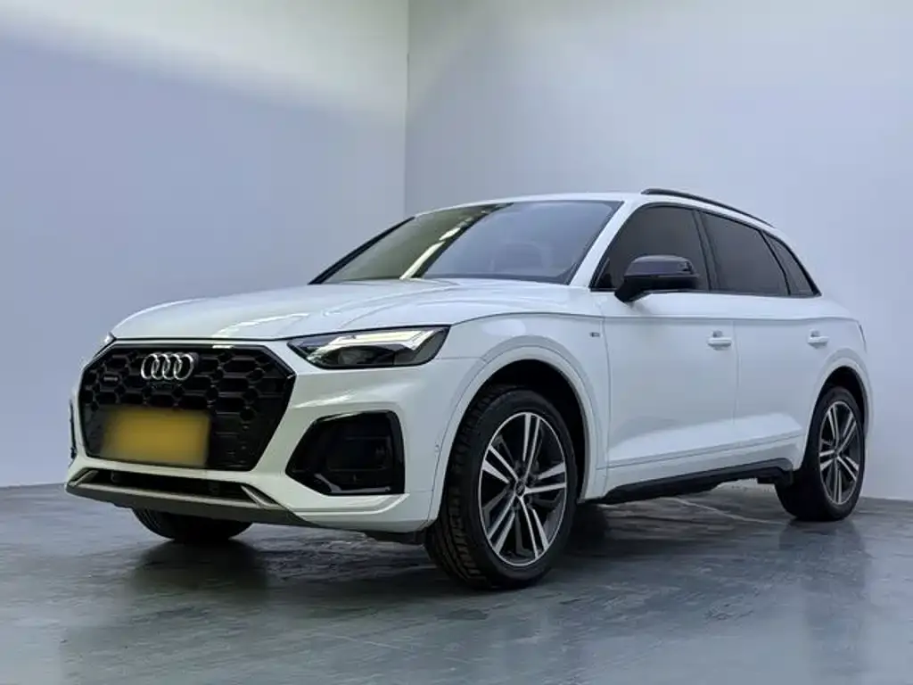 Audi Q5L — фото 10