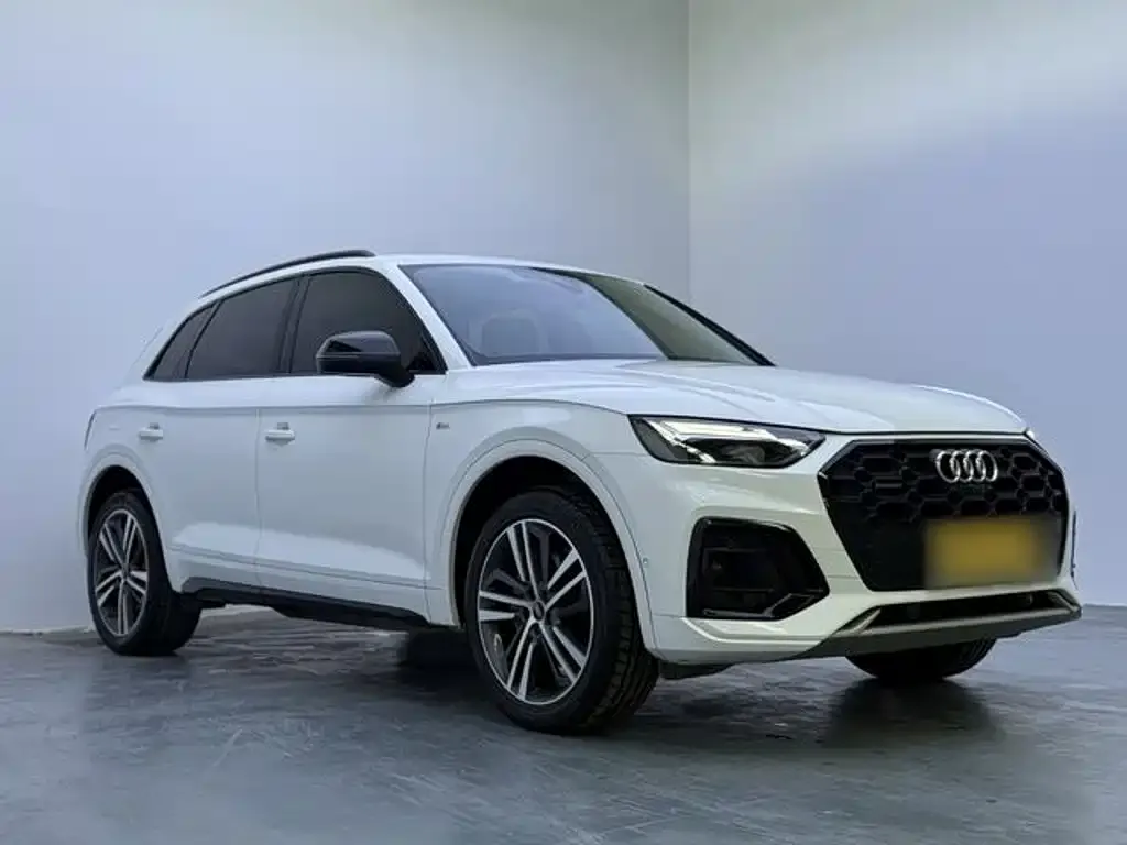 Audi Q5L — фото 5