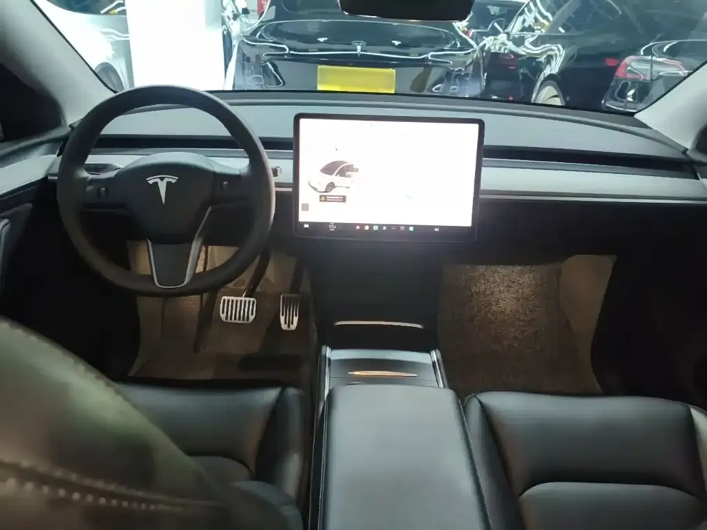 Tesla Model Y — фото 7