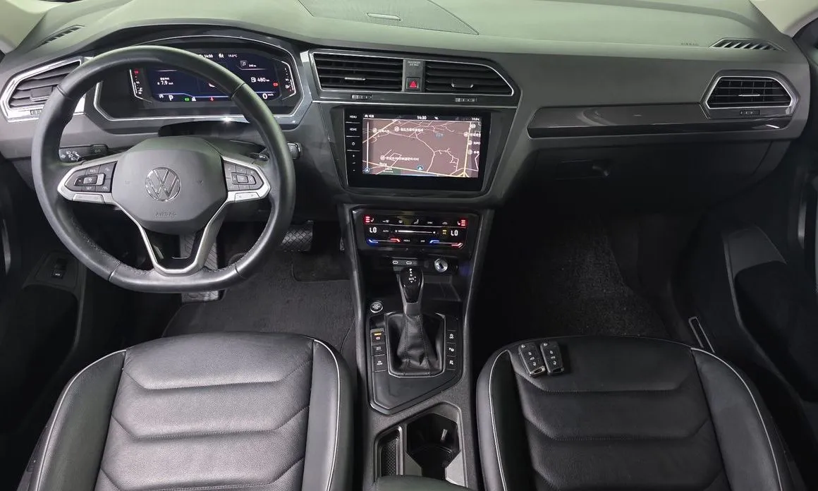 Volkswagen Tiguan — фото 9