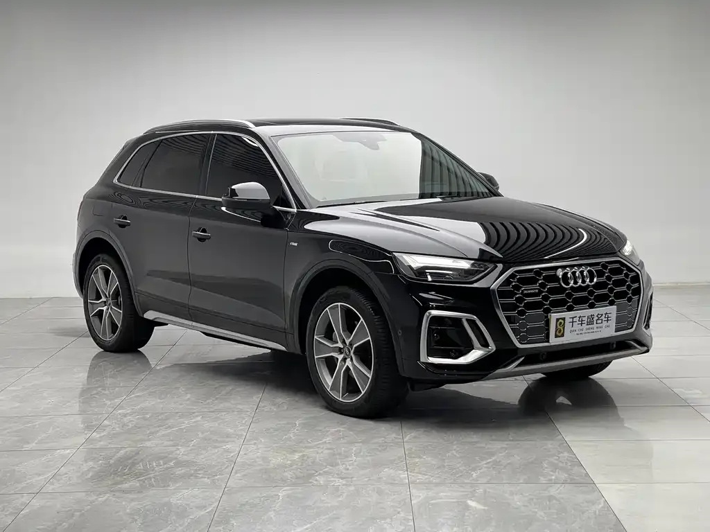 Audi Q5L — фото 9