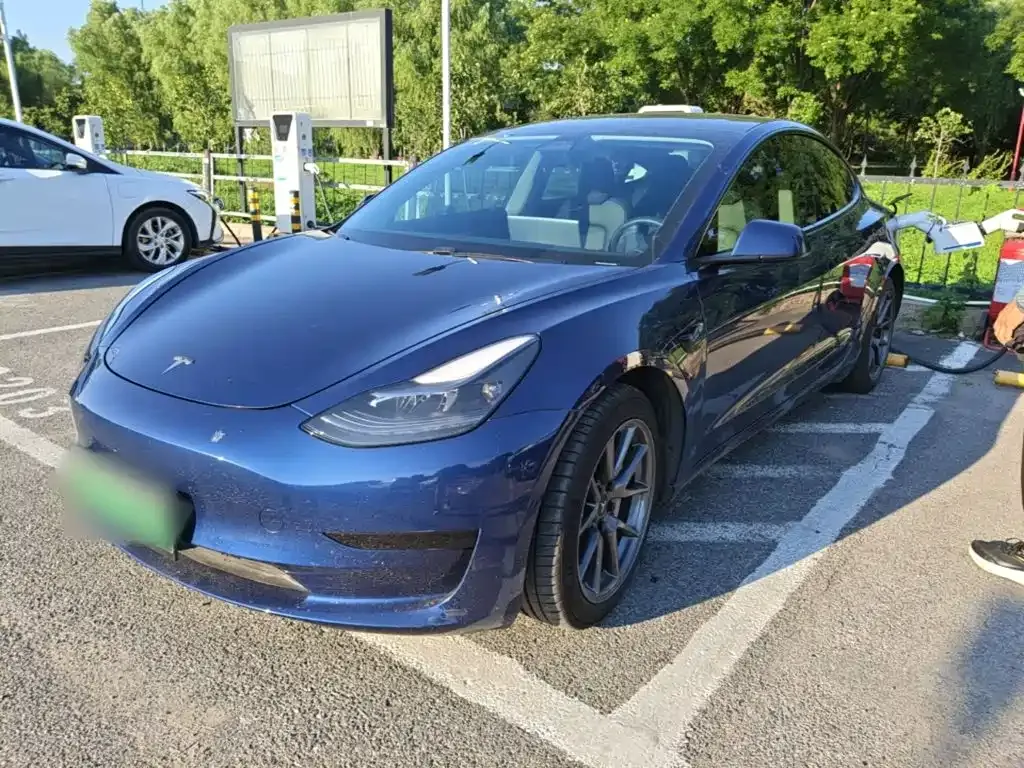 Tesla Model 3 — фото 9