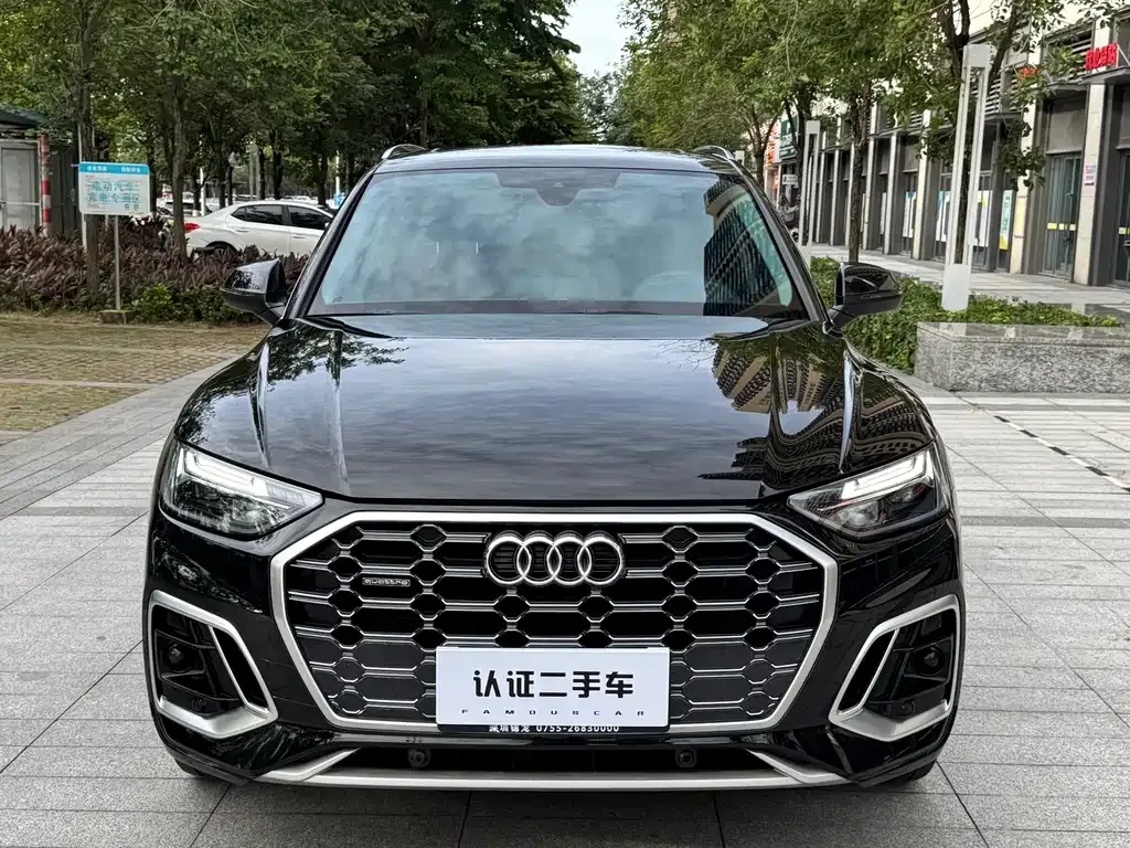 Audi Q5L — фото 5