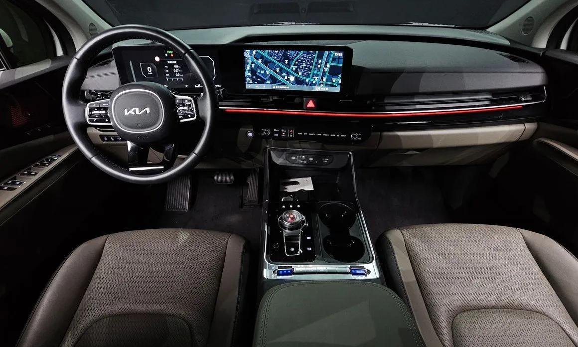 Kia Carnival — фото 10