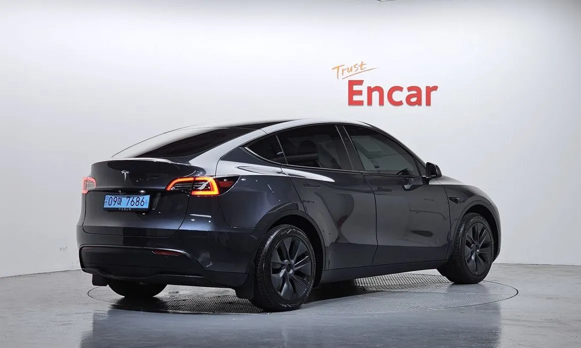 Tesla Model Y — фото 7
