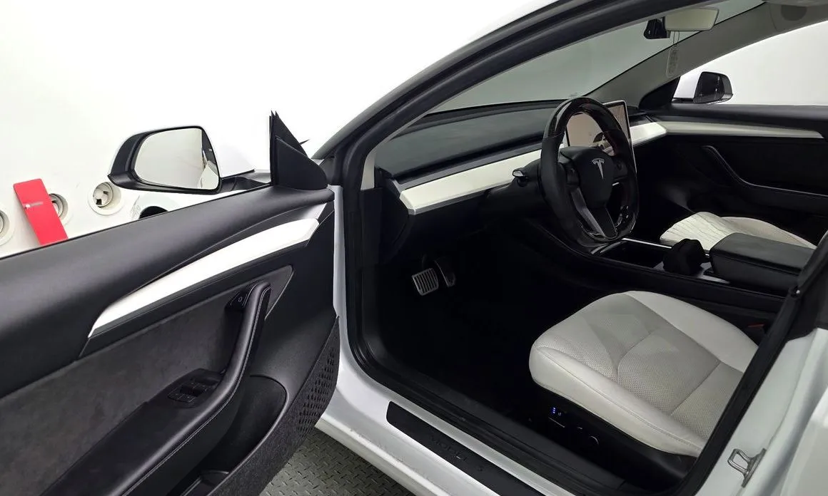 Tesla Model 3 — фото 6