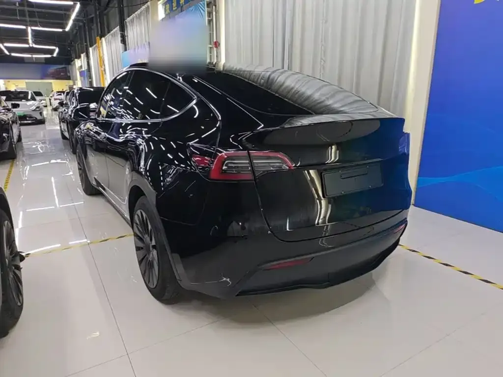 Tesla Model Y — фото 7