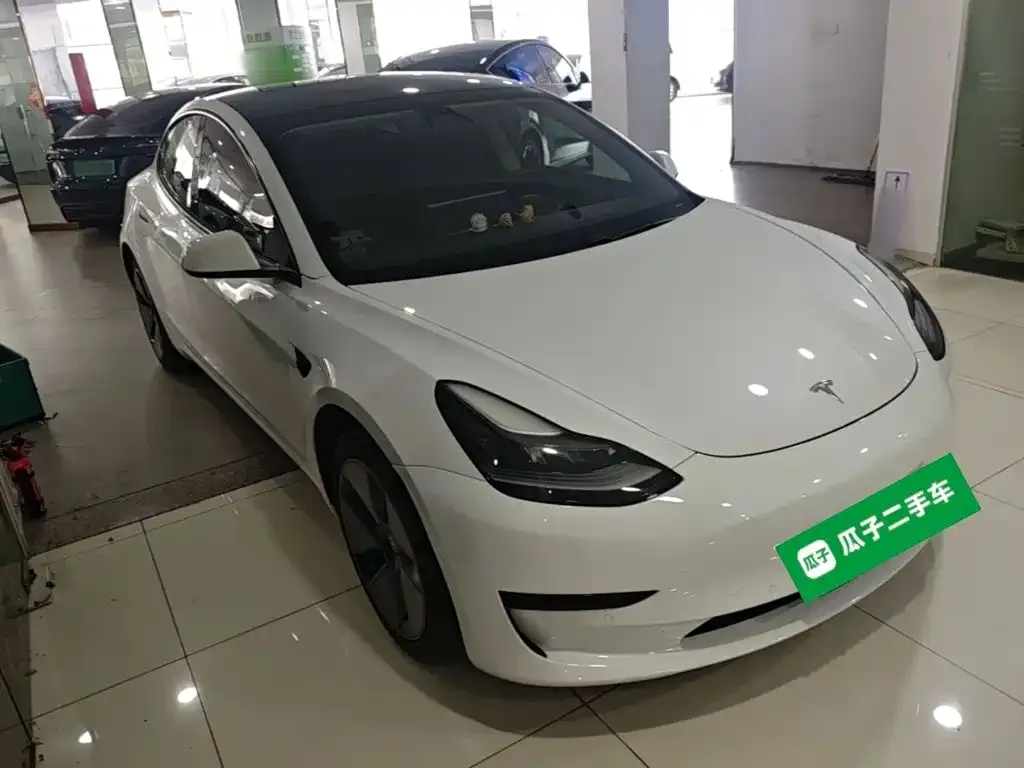 Tesla Model 3 — фото 7