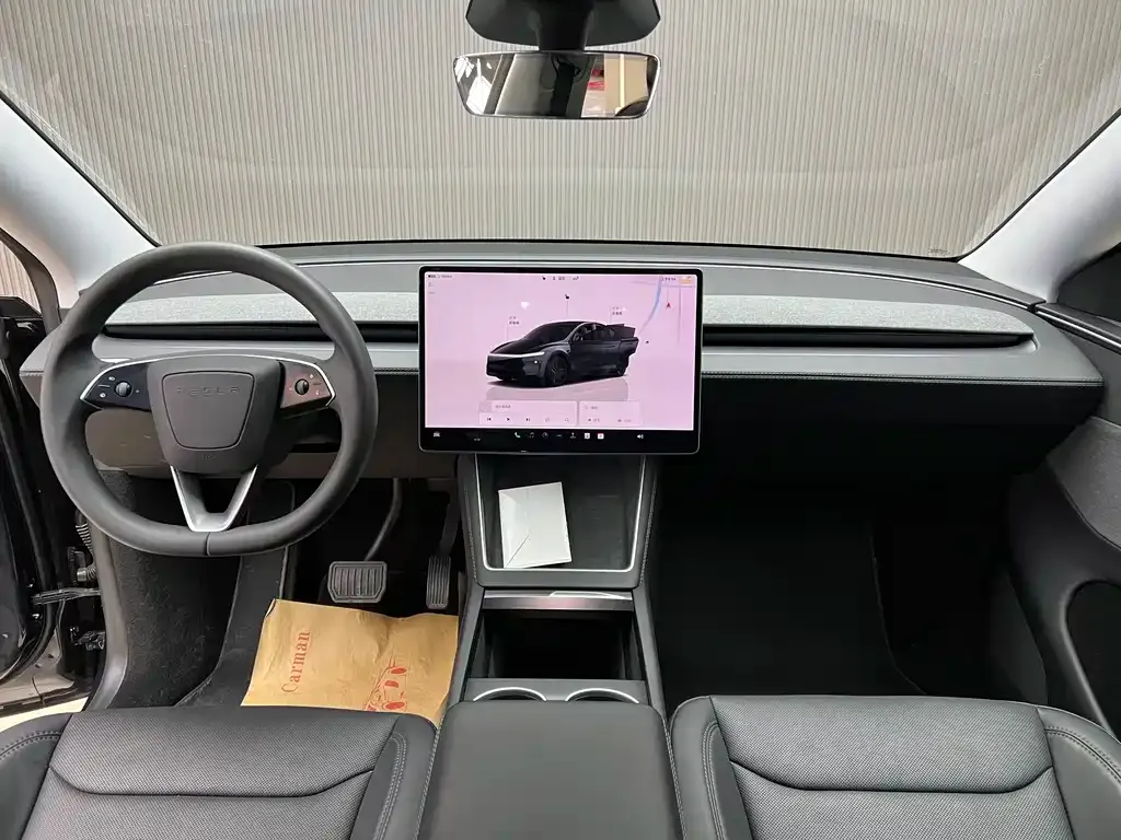 Tesla Model Y — фото 9