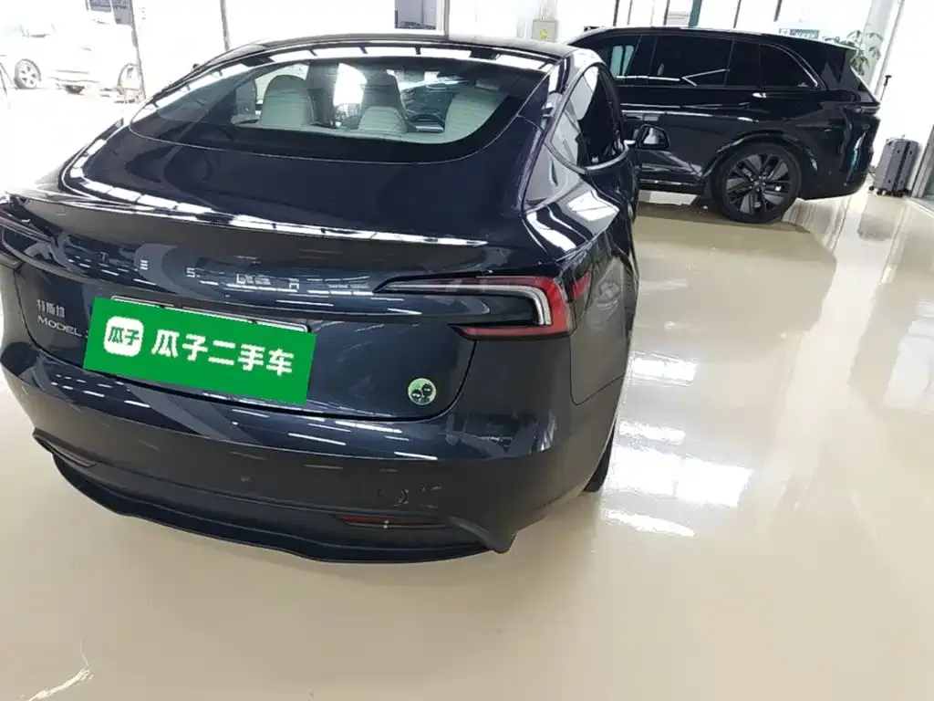 Tesla Model 3 — фото 10