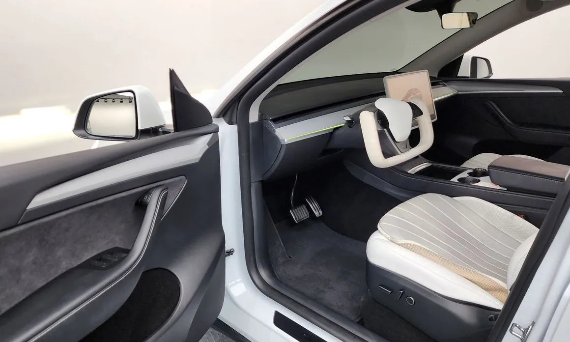 Tesla Model Y — фото 9