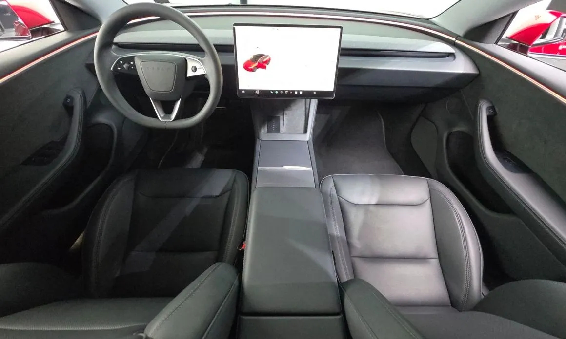 Tesla Model 3 — фото 7