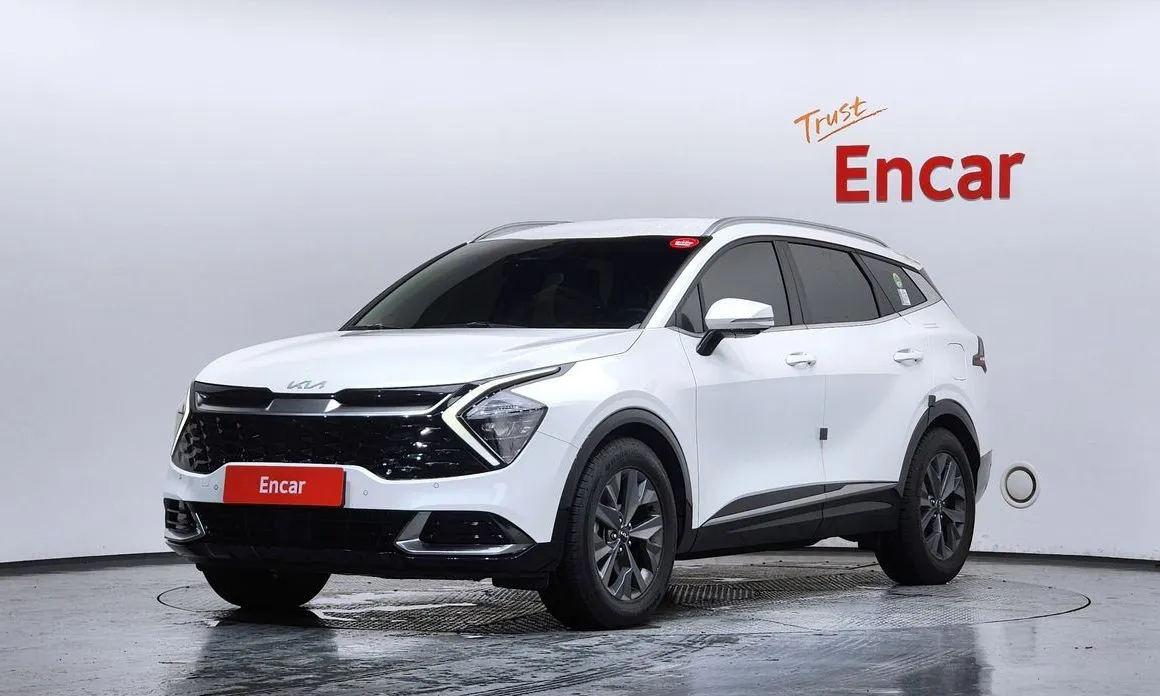 Kia Sportage — фото 1