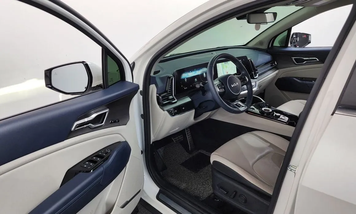 Kia Sportage — фото 6