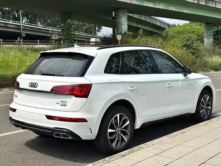 Audi Q5L — фото 7