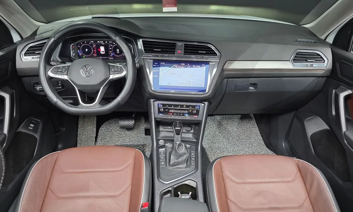 Volkswagen Tiguan — фото 9