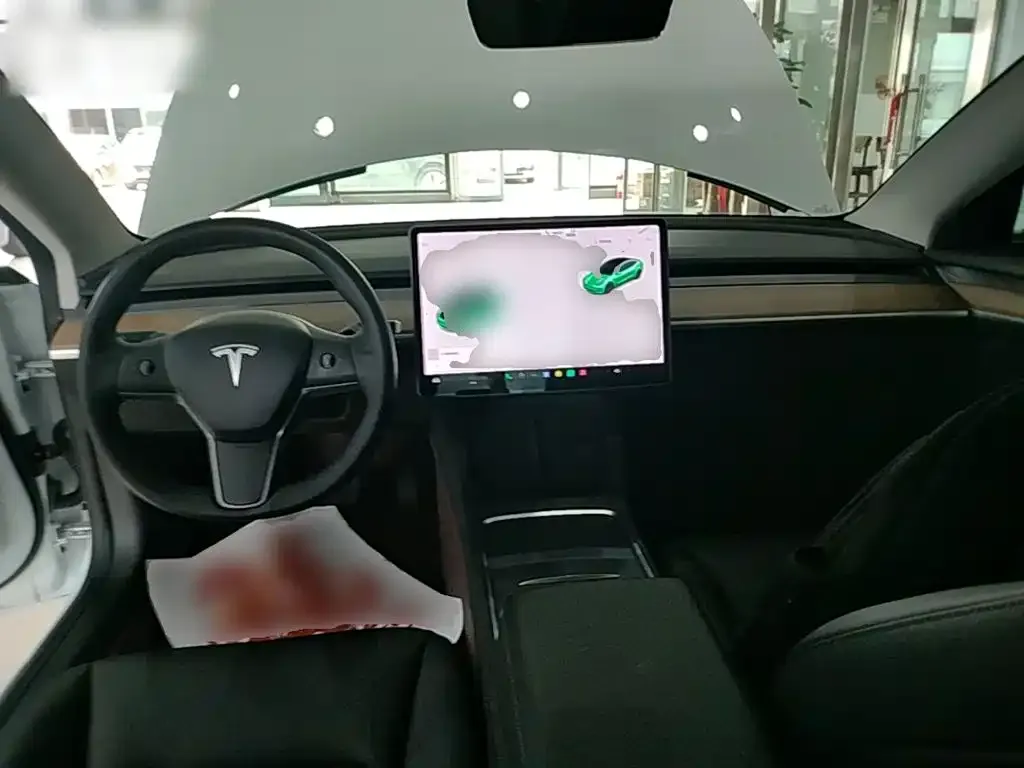 Tesla Model 3 — фото 9