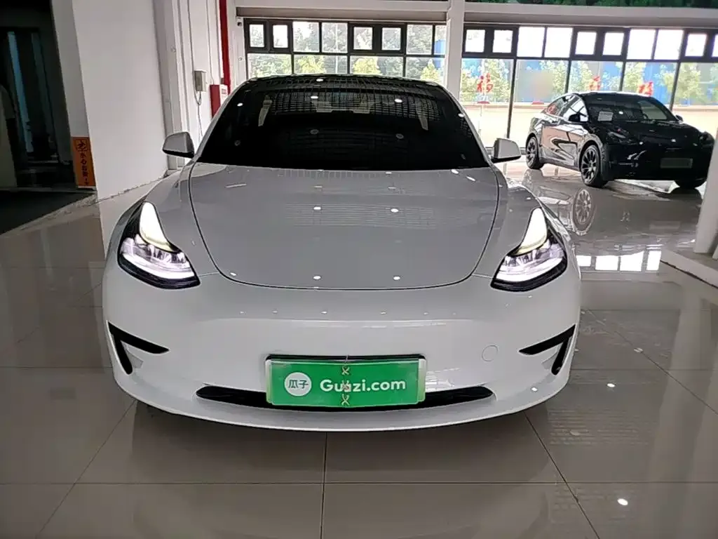 Tesla Model 3 — фото 6