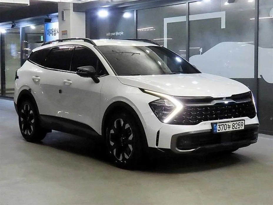 Kia Sportage — фото 1