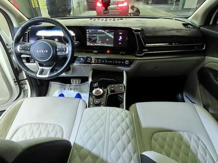 Kia Sportage — фото 7