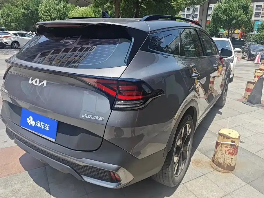 Kia Sportage — фото 9