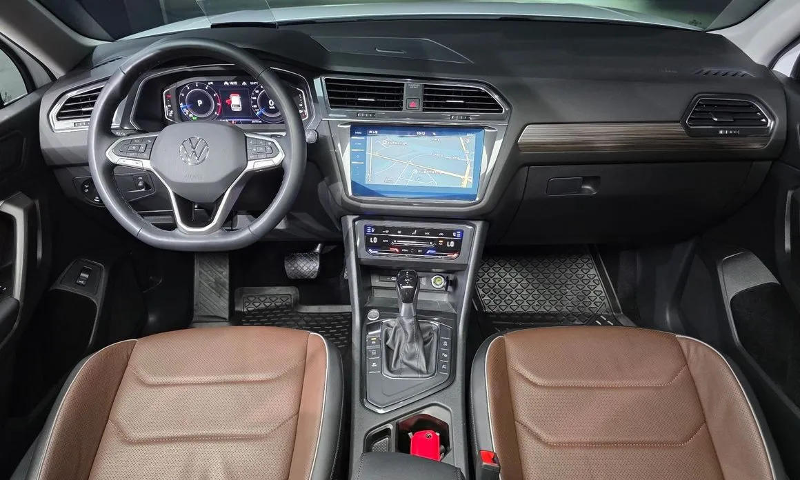 Volkswagen Tiguan — фото 10