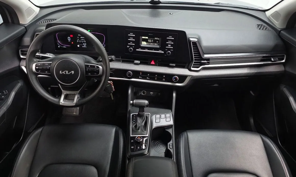 Kia Sportage — фото 9