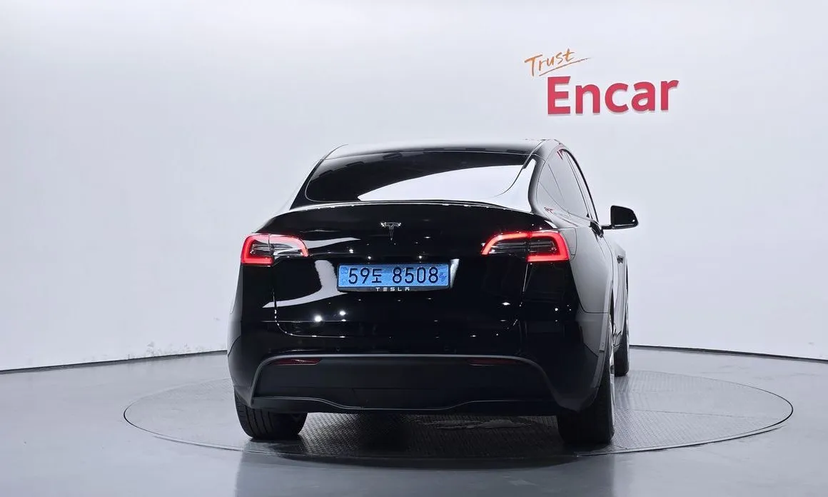 Tesla Model Y — фото 5
