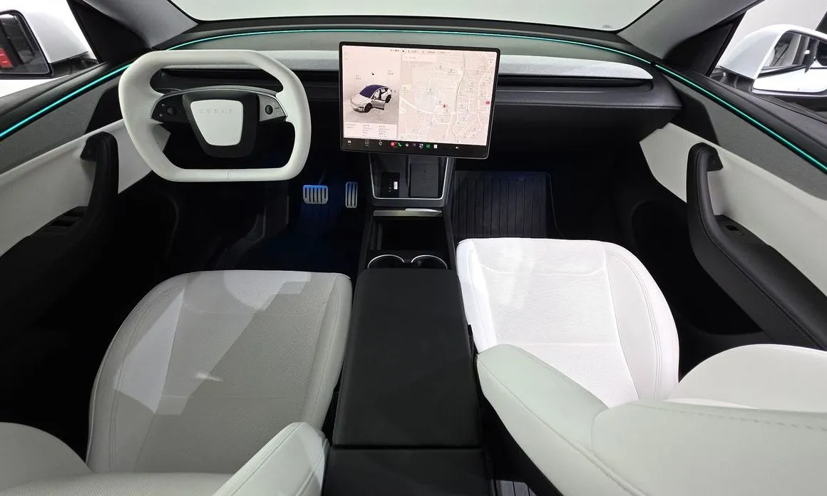 Tesla Model Y — фото 7