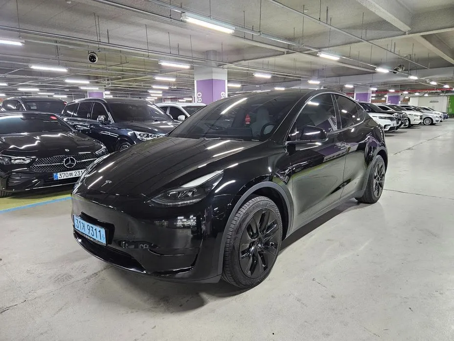 Tesla Model Y — фото 10
