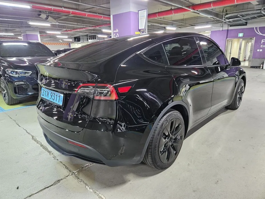Tesla Model Y — фото 7