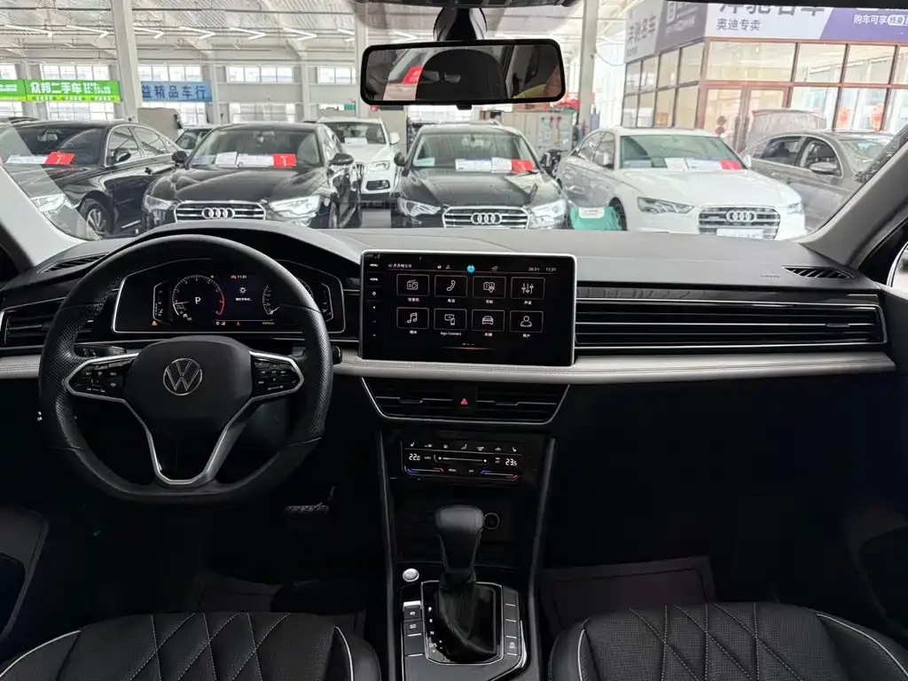 Volkswagen Tiguan L — фото 2