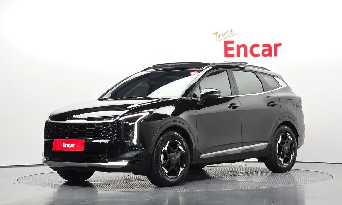 Kia Sportage — фото 1