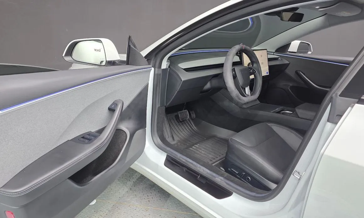 Tesla Model 3 — фото 9